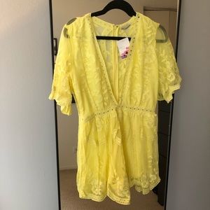 Bright yellow lace romper
